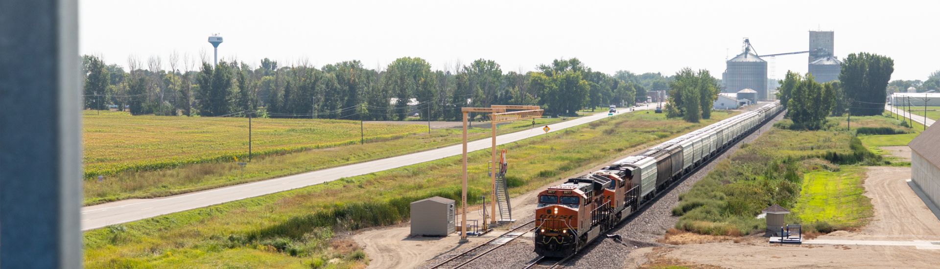 A train leaving a grain terminal.