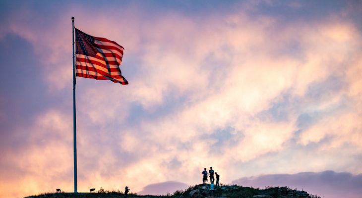An image of an American Flag at sunset.